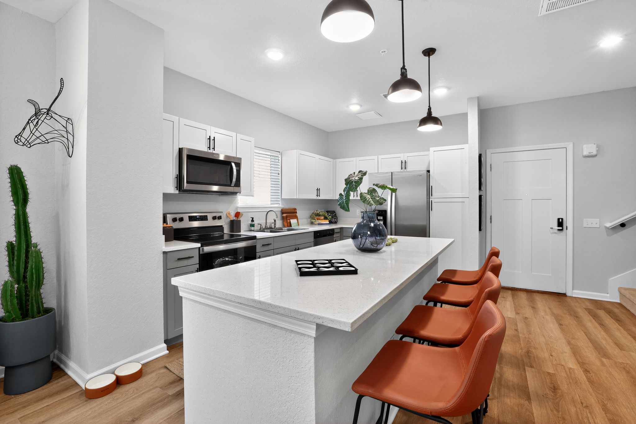 Modern kitchen with stylish seating.