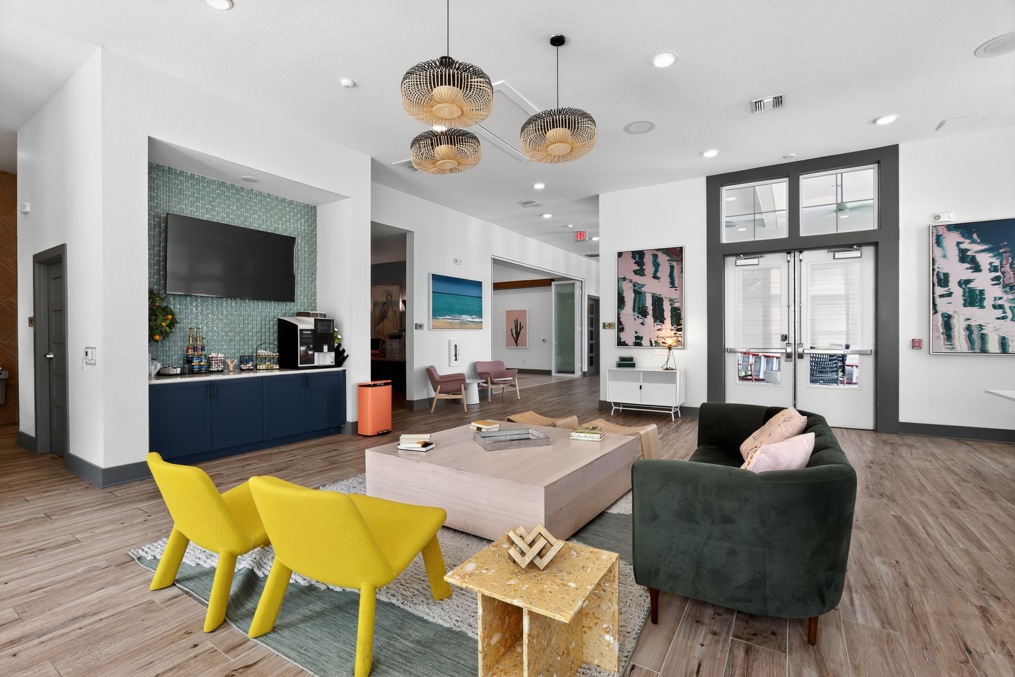 Modern lounge with colorful furniture.